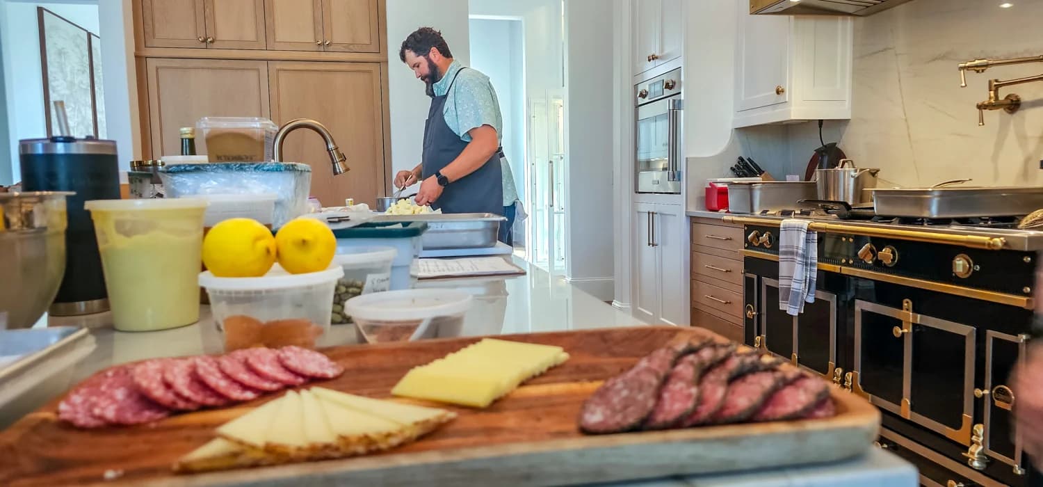 The chef plating in the kitchen