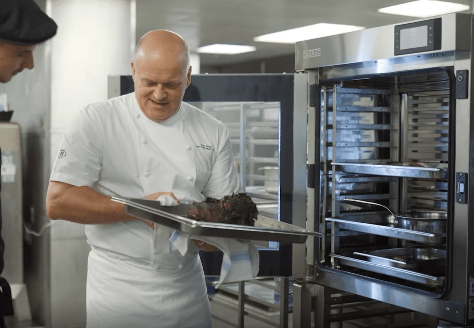 Why Do Chefs Use Towels Instead of Oven Mitts?